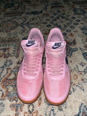 Nike Pink Low-Top Sneakers with Navy Swoosh